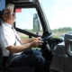 Voigt Bus driver seen from the side mid drive